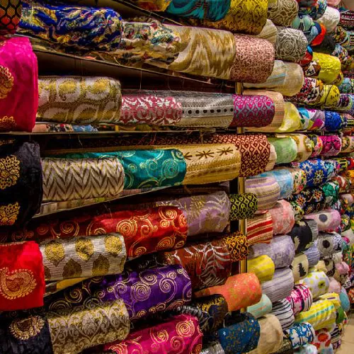 راهنمای انتخاب پارچه مانتو مجلسی